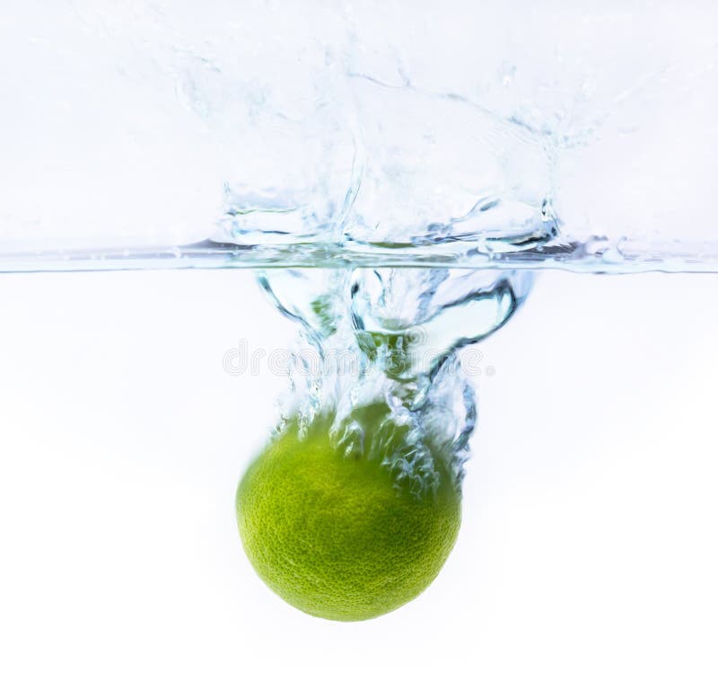 Green Lemon Falling into the Water Stock Photo - Image of lemon, drink ...