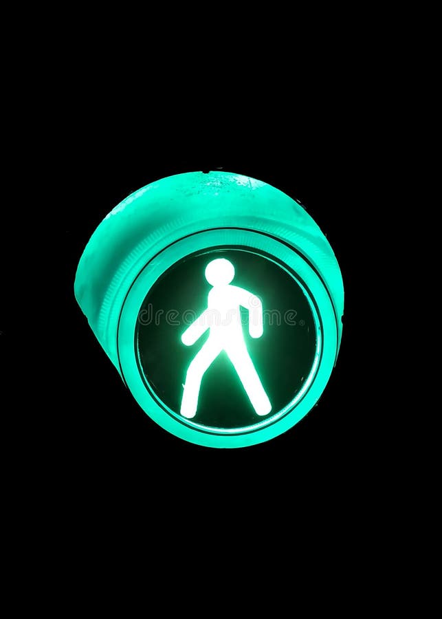 Green light at traffic lights for pedestrians to cross the road. royalty free stock image Green light at traffic lights for pedestrians to cross the road. royalty free stock image