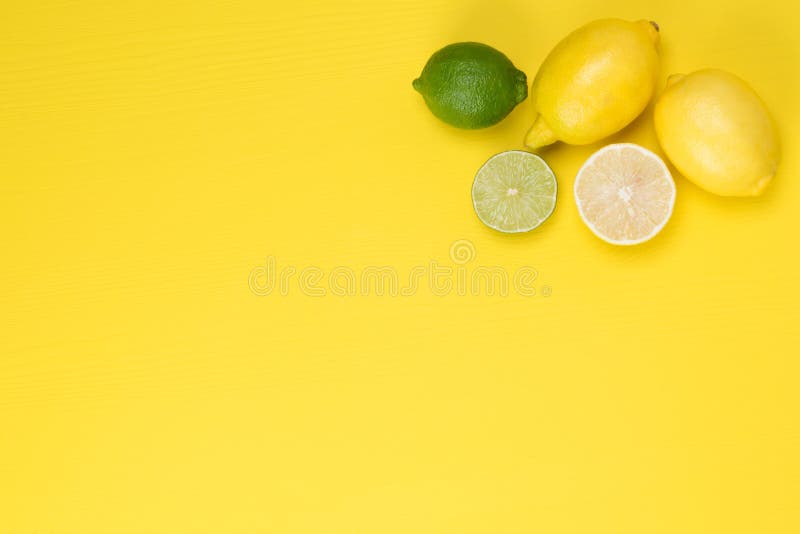 Green Limes with Lemons, on a Yellow Stock Photo Image of nutrition, juice 113646798
