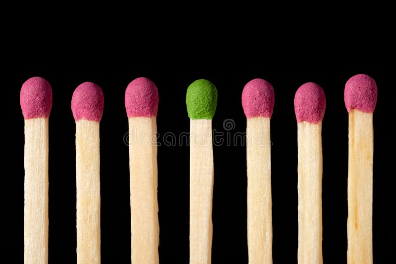 Green Match in the Middle of Red Matches Stock Image Image of
