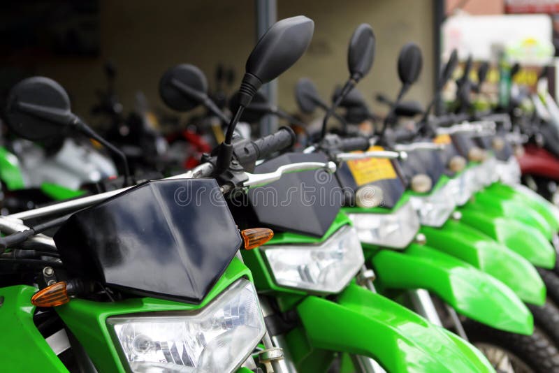 Green Motor Bikes in a Row