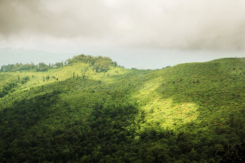 Green Mountain Peak Top View with Cloud Sky Shadow Background Landscape