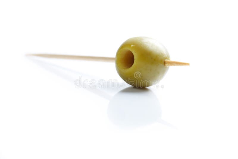 Green olive and toothpick