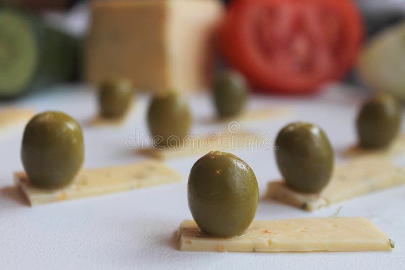 Green olives and cheese stock image. Image of olive, ingredient 53843467