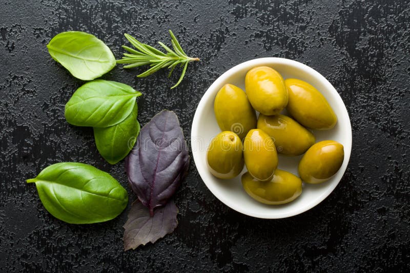 Green olives and herbs stock photo. Image of food, antioxidant 55966550