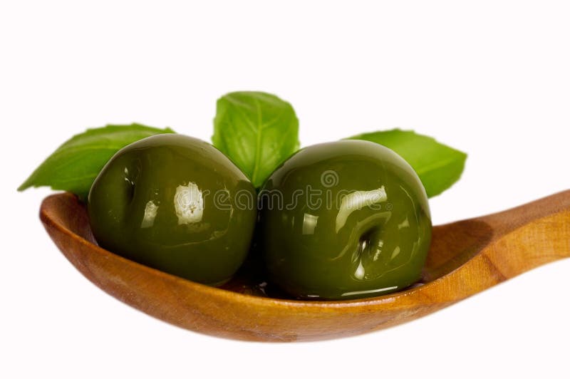 Green olives in oil stock photography Green olives in oil stock photography