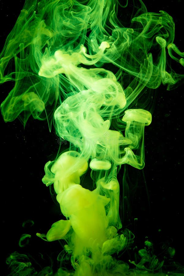 Green Paint Dissolves in Water Isolated on Black Background Stock Photo ...