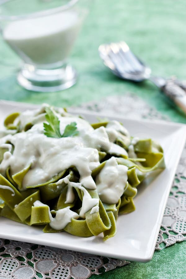 Green Pasta With Cheese Sauce Stock Photo Image of food, meal 18095660