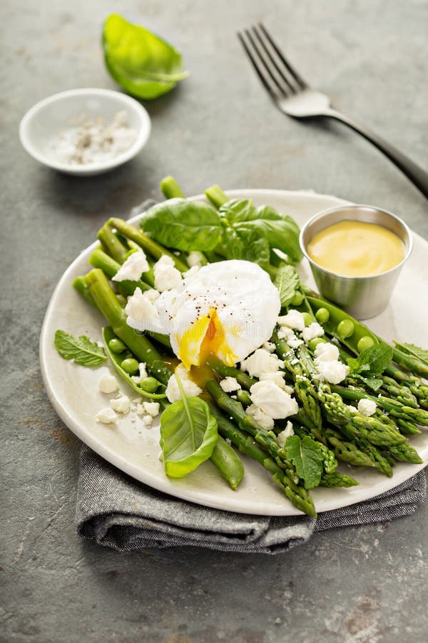 Green peas and asparagus with poached egg