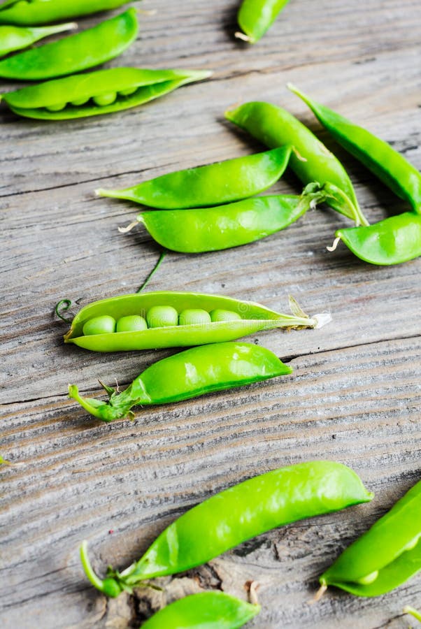 Download Green Peas In Pods Young On Gray Wooden Background, Rustic ...