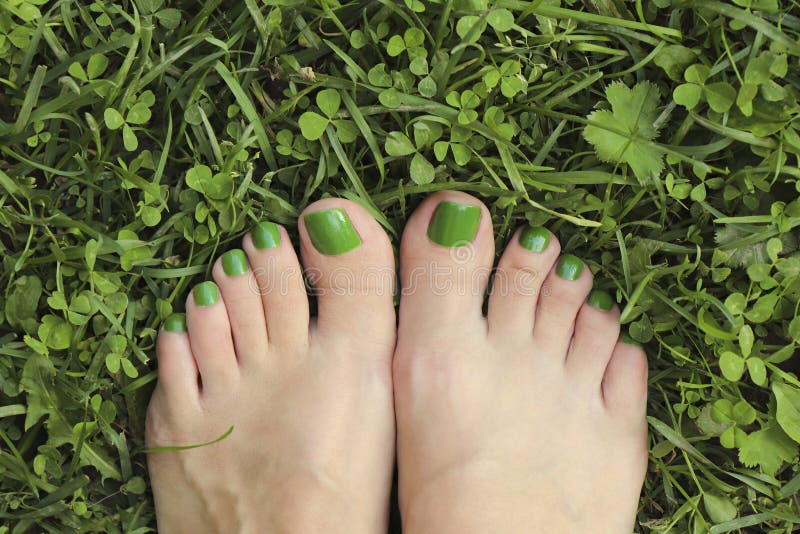 Multicolored Pedicure And Manicure With Rhinestones On Oval Long Female  Nails Stock Photo - Download Image Now - iStock