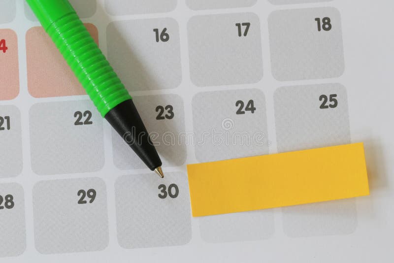 Green pen points to a thirty number of calendar and have blank y