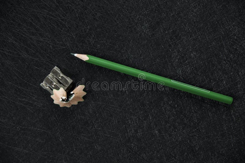 Green pencil sharpener and sharpened rubbish stock image Green pencil sharpener and sharpened rubbish stock image