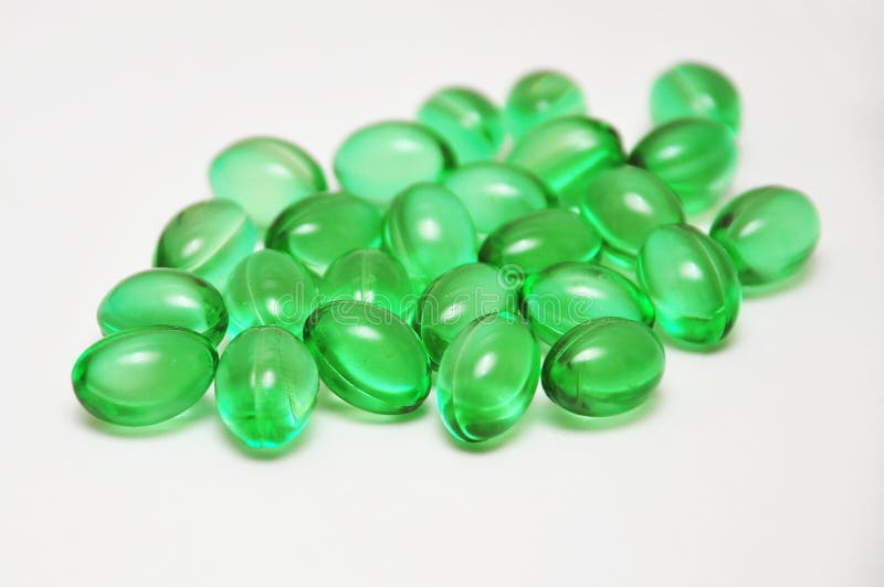 Green pills stock image. Image of capsule, cold, gelatin 26107777