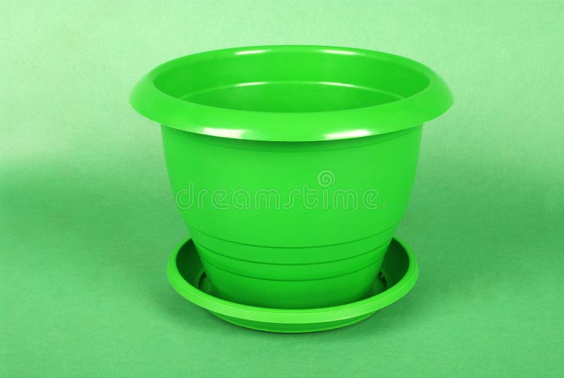 Green Plastic Flower Pots stock image. Image of earthenware 134799913