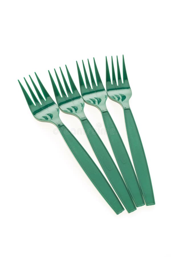 Green plastic forks stock photo. Image of orange, equipment 81636300