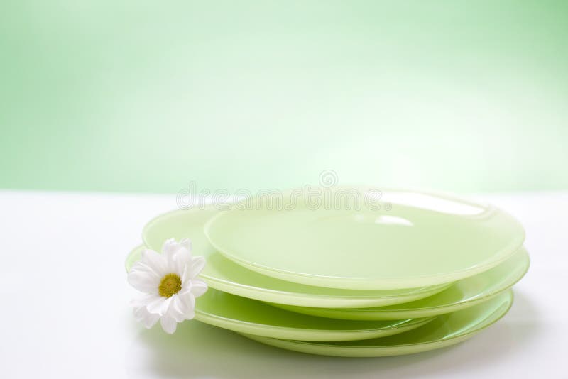 Green plates stock images