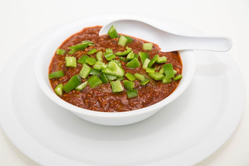 Green Poblano Chili Peppers on Chili in White Bowl