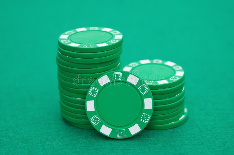 Stack of green poker chips stock photo. Image of gambler 51100874