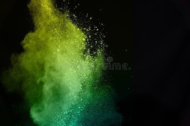 Green Powder Explosion Isolated On Black Background.Colored Dust Splash