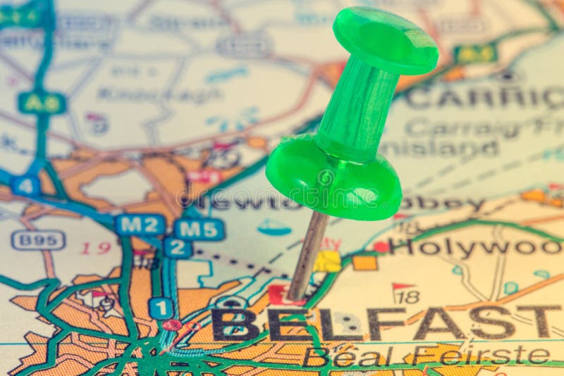 Green pushpin on the Northern Ireland map showing Belfast location. Green pushpin on the Northern Ireland map showing Belfast location