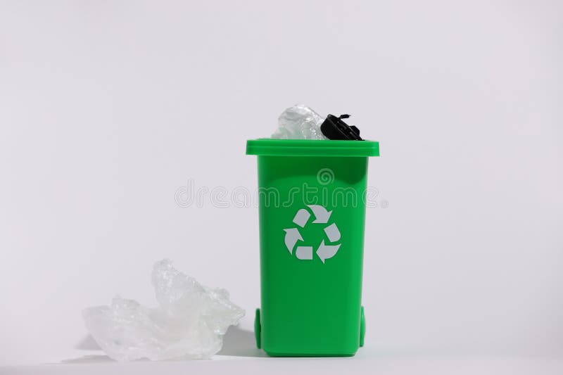 Green recycling bin, recycle trash comtainer, isolated stock photography