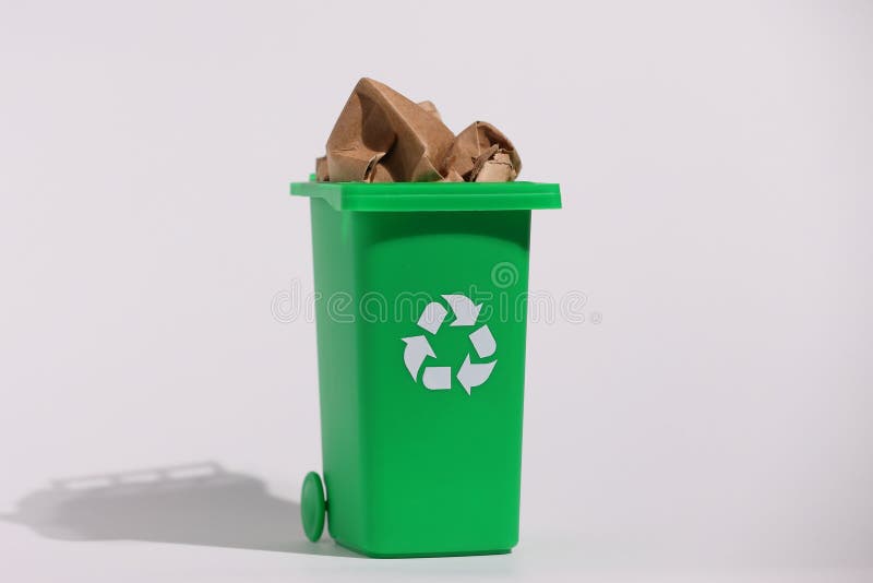 Green recycling bin, recycle trash comtainer, isolated stock photo