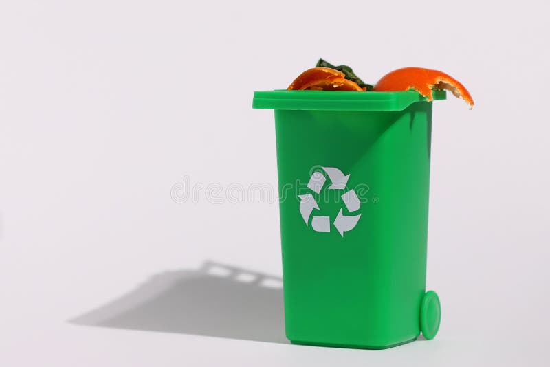 Green recycling bin, recycle trash comtainer, isolated stock photography