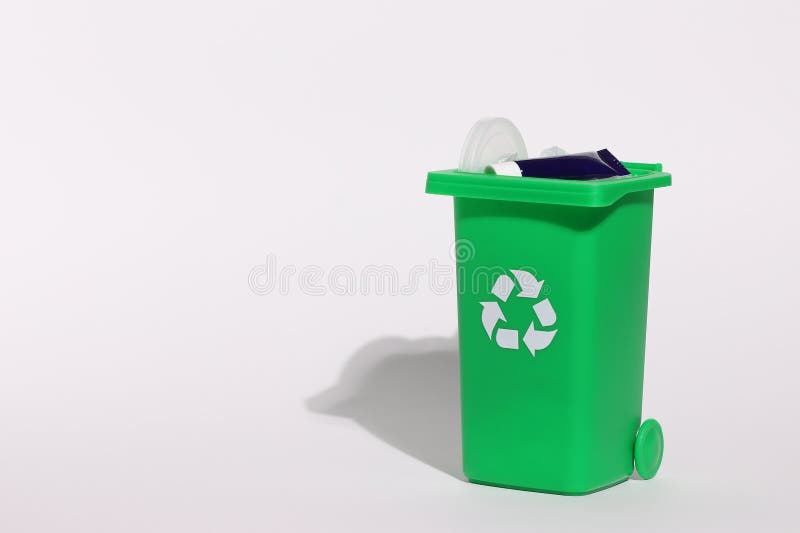 Green recycling bin, recycle trash comtainer, isolated stock image