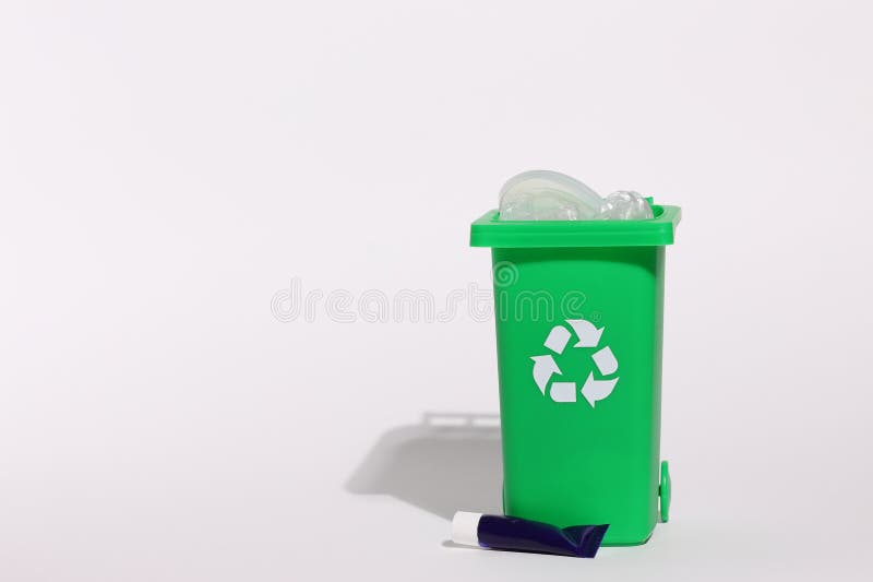 Green recycling bin, recycle trash comtainer, isolated stock photography