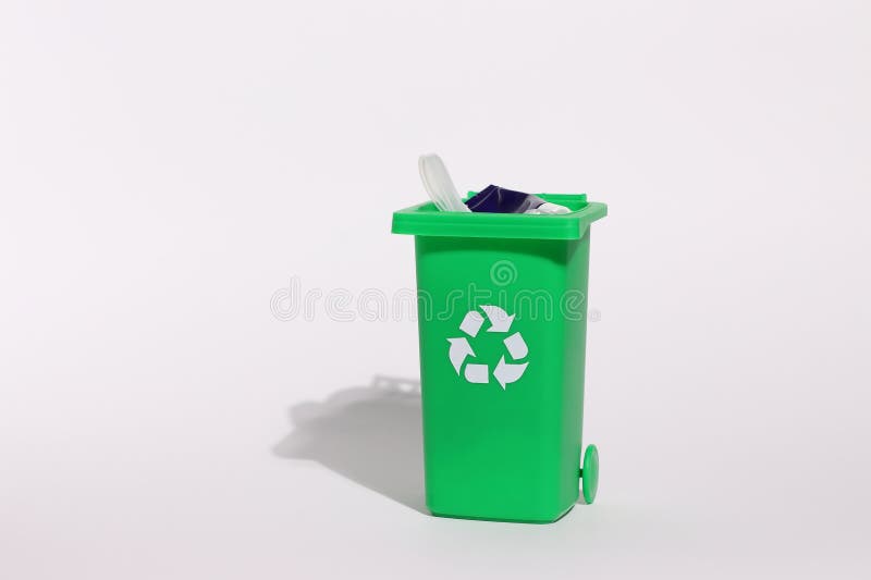 Green recycling bin, recycle trash comtainer, isolated royalty free stock photography