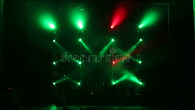 Green and red beautiful rays of light on an empty stage before the concert. vector illustration