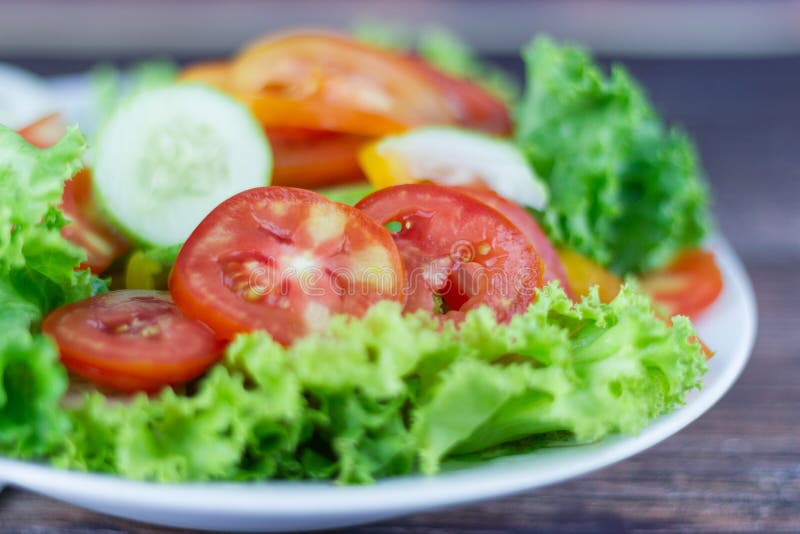 A Green Salad is a Dish of a Mixture of Small Vegetables Stock Photo