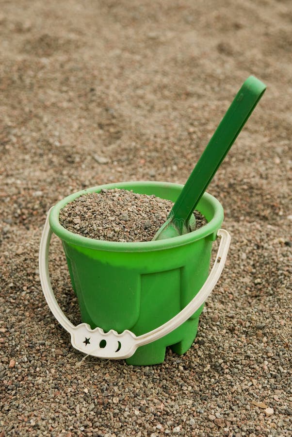 Green sand bucket stock image. Image of full, standing 8087777