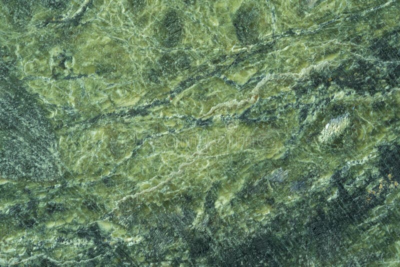 Raw Serpentinite Stone on White Stock Image - Image of natural