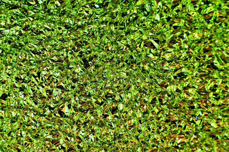 Green shiny background texture pattern of the structure of a unique variety, bright and fun glistening lights of Christmas, New royalty free stock photos Green shiny background texture pattern of the structure of a unique variety, bright and fun glistening lights of Christmas, New royalty free stock photos