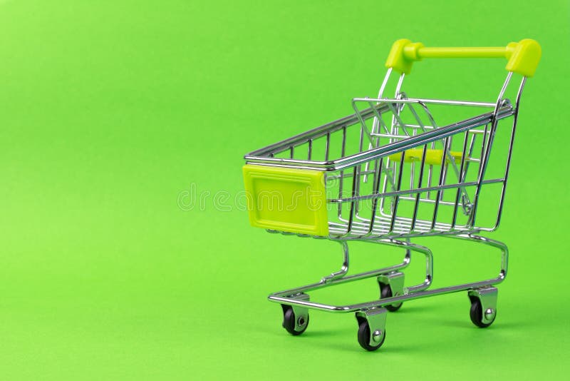 Green shopping cart royalty free stock image