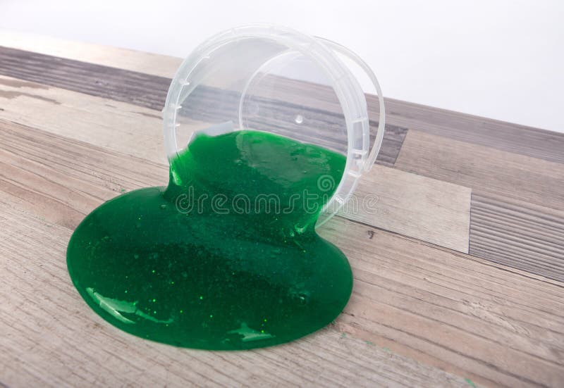 Green Slime Flowing Out Of A Plastic Bucket Stock Photo Image of