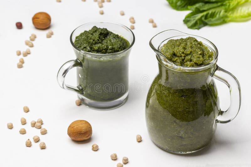 Green Smoothie in Glass Jars. Nuts and Chickpeas on the Table Stock