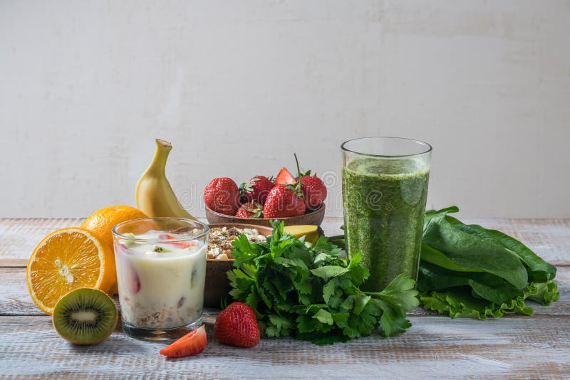 Green smoothie and muesli with fruits