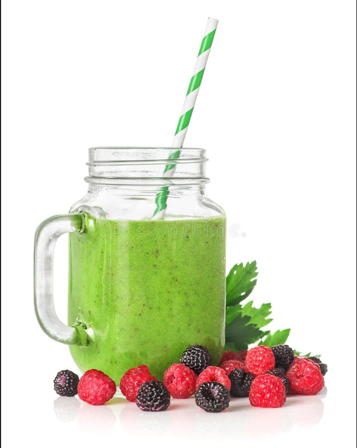 Green smoothies in a glass jar stock photo Green smoothies in a glass jar stock photo