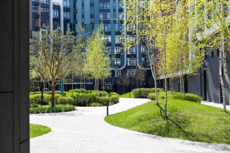 A closer look at Apartment Building With Green Spaces