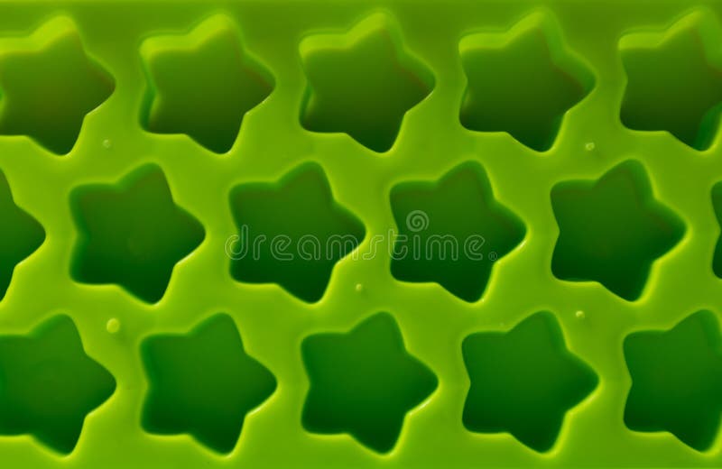 The green star many arranged in multiple layers stock photos