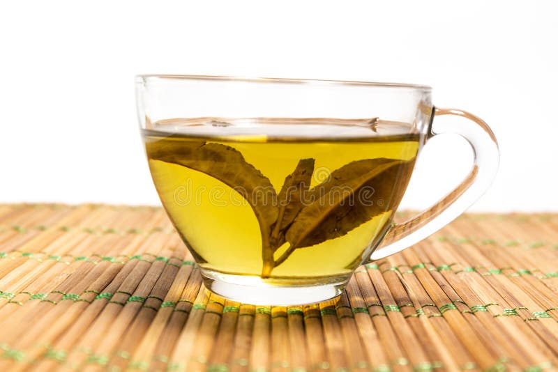 Green tea in a cup stock photo. Image of flower, horizontal 139709516