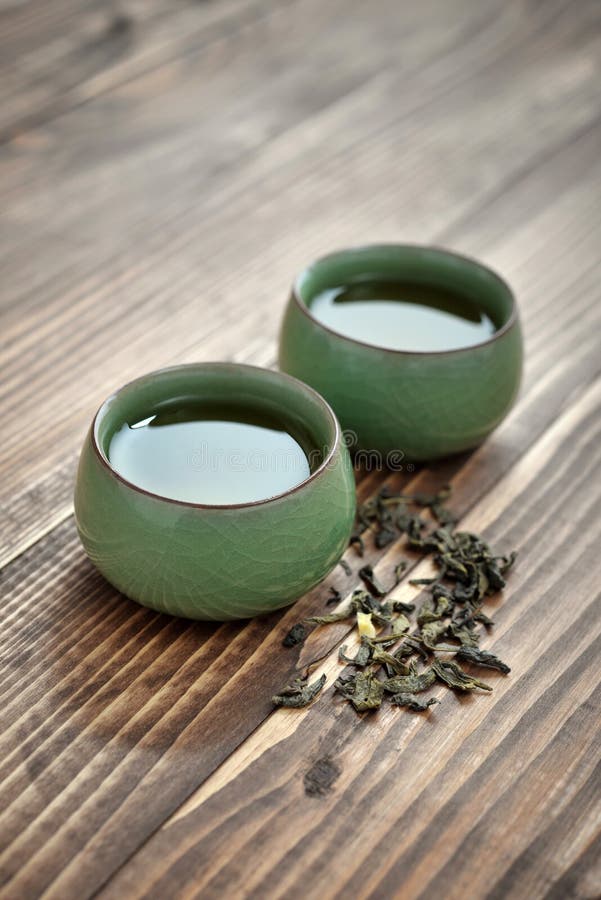 Green tea in cups stock image. Image of slate, blue, ceramic 69396799