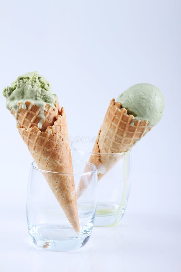 Yellow Passion Fruit and Red Strawberry Ice Cream Cones Stock Photo