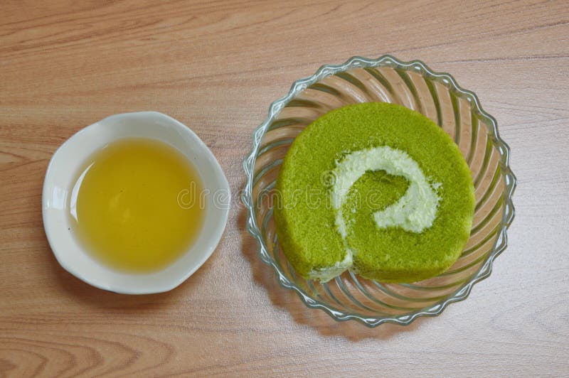 Green tea jam roll and tea stock image. Image of sponge 51774825