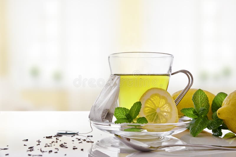 Green tea cup and teabag stock image. Image of drink 28616033