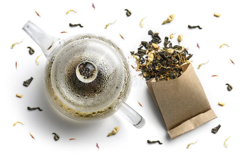 Green Tea with Natural Aromatic Additives and a Teapot. Top View on