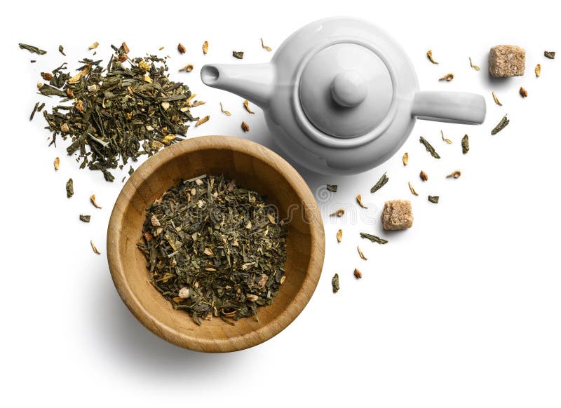 Green Tea with Natural Aromatic Additives and a Teapot. Top View on